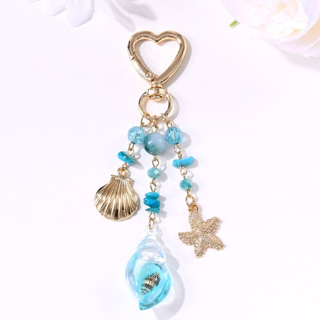Keychain with Sparkling Sun Motif Kalsten