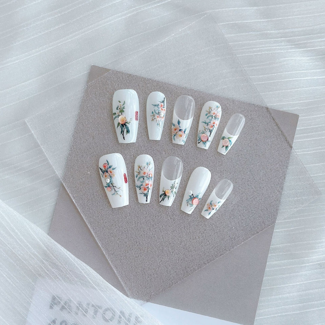 Artistic Press-On Nail Art Set with Heart and Celestial Designs