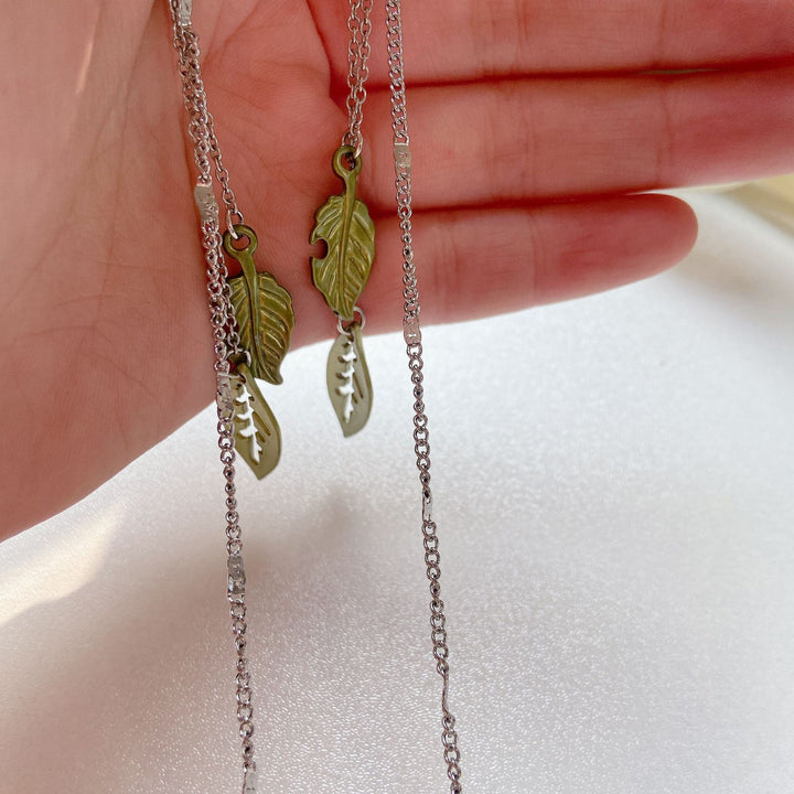 Fashionable glasses holder chain with leaf motifs Kalsten