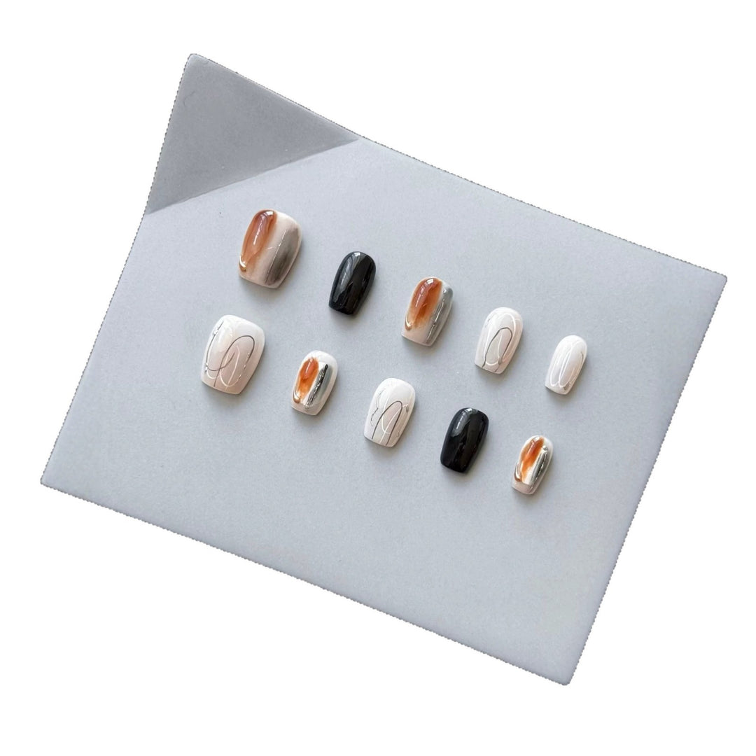 Artistic Press-On Nail Set with Marble and Glossy Finish