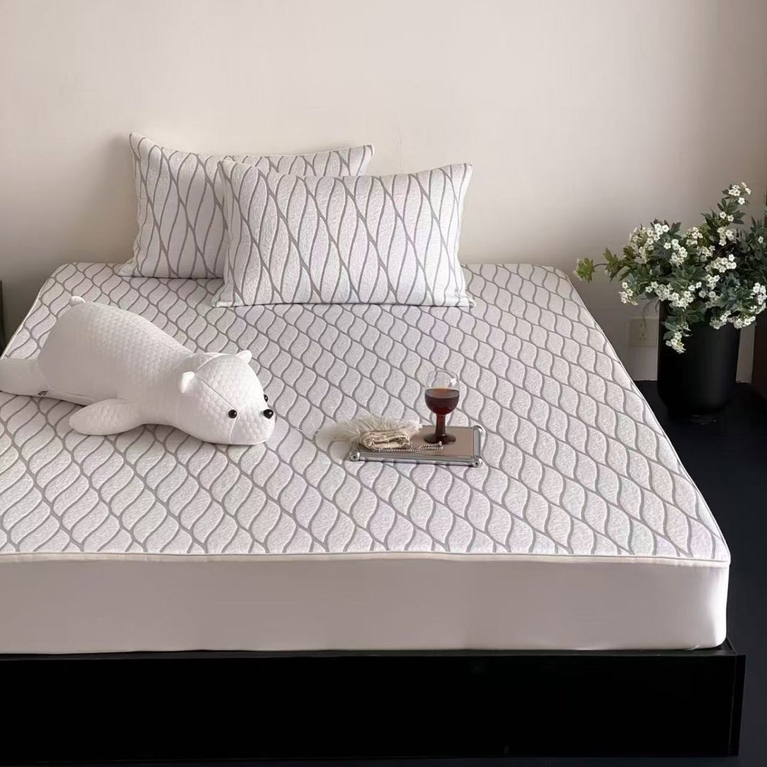 Quilted mattress topper set with non-slip underside, breathable microfiber and pillowcases