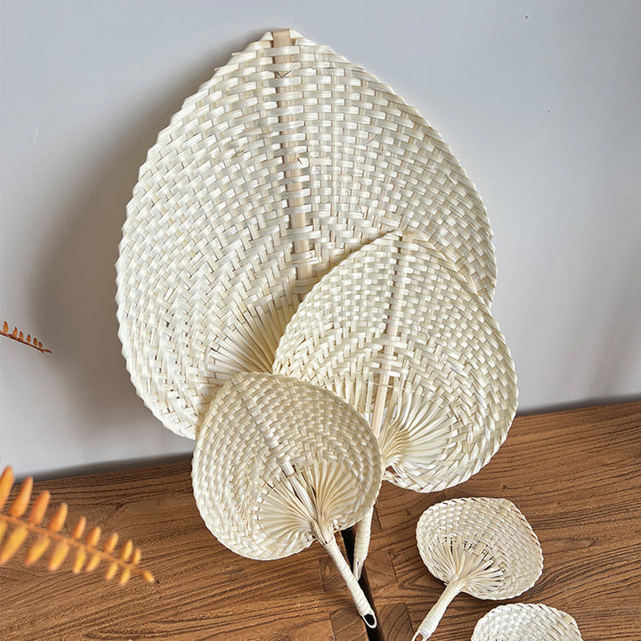Women hand-woven fan made of natural material Kalsten