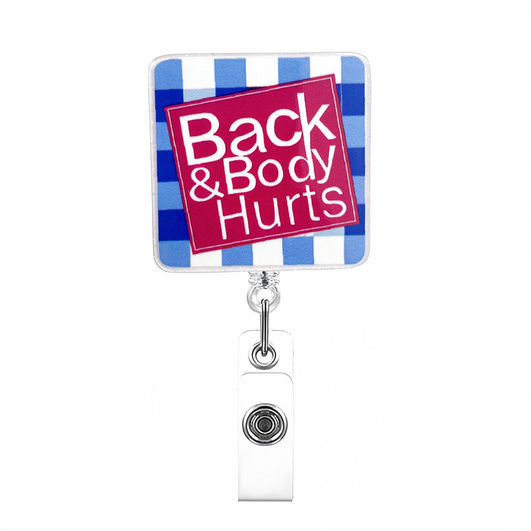 Expandable badge holder with anatomical heart pendant