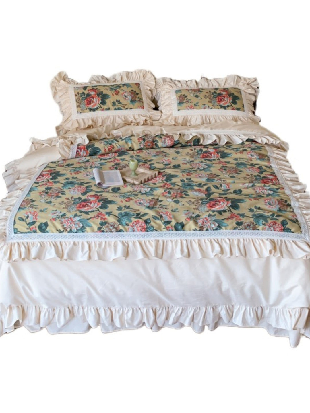 Romantic bedding set with ruffles, floral inserts and decorative pillowcase