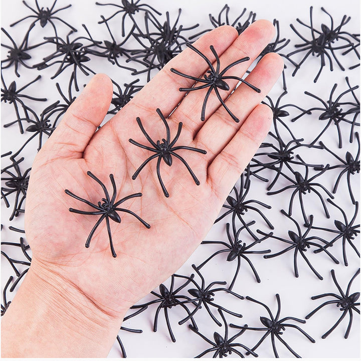 Decorative spider web with artificial spiders