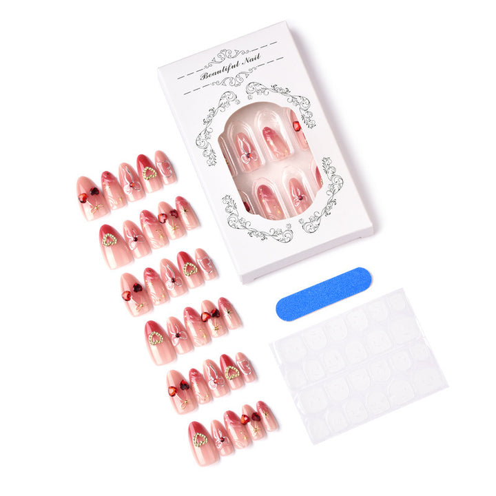 Decorative artificial nails with romantic heart and bow motifs Kalsten