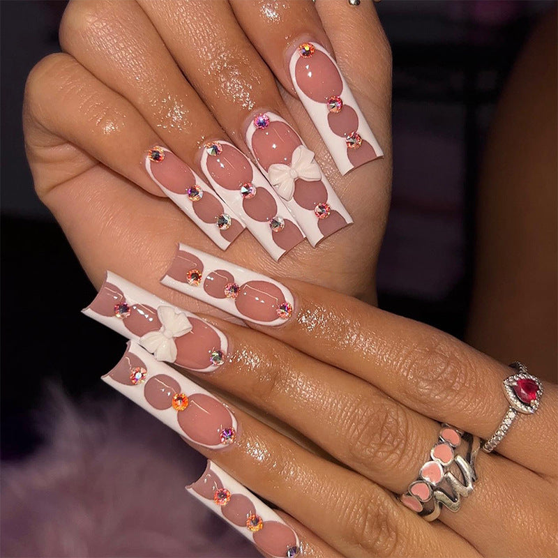 Elegant and artistic nail art with rhinestone details Kalsten
