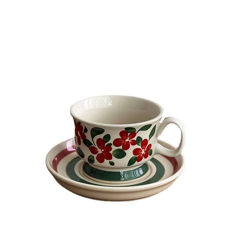 Ceramic coffee cup set with saucer and hand-painted leaf ornament