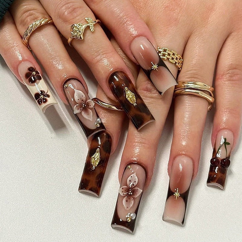 Artificial Nail Art with floral and glamorous design Kalsten