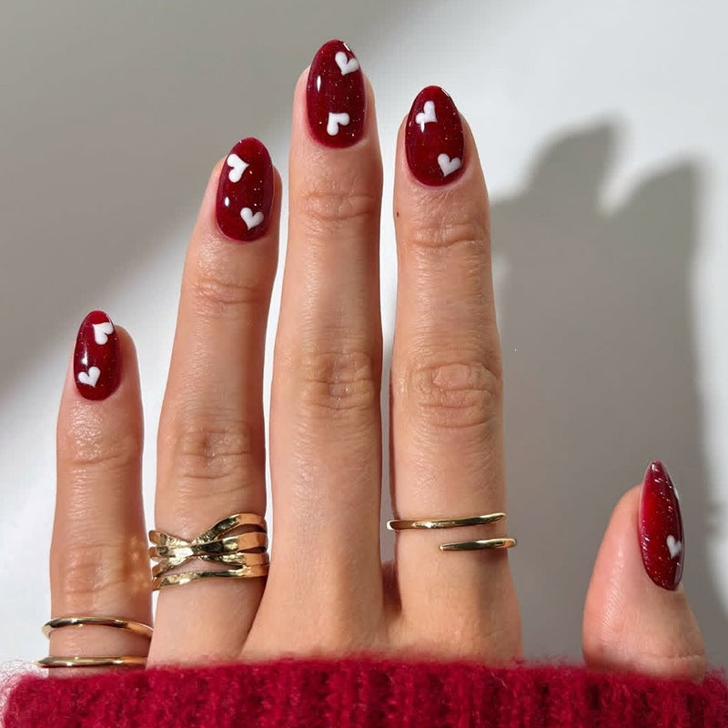 Acrylic nail set with romantic heart designs Kalsten