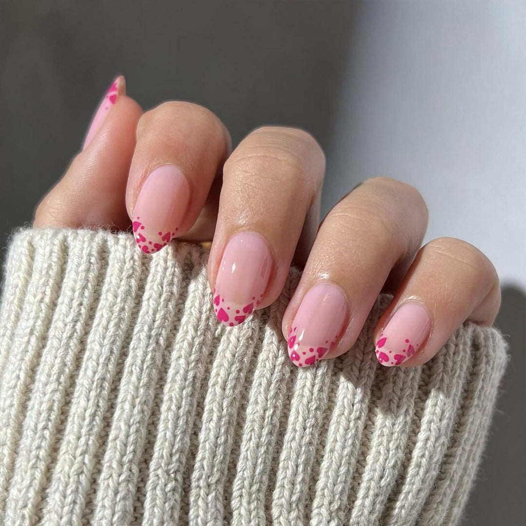 Artificial nail extensions with heart tip accents Kalsten