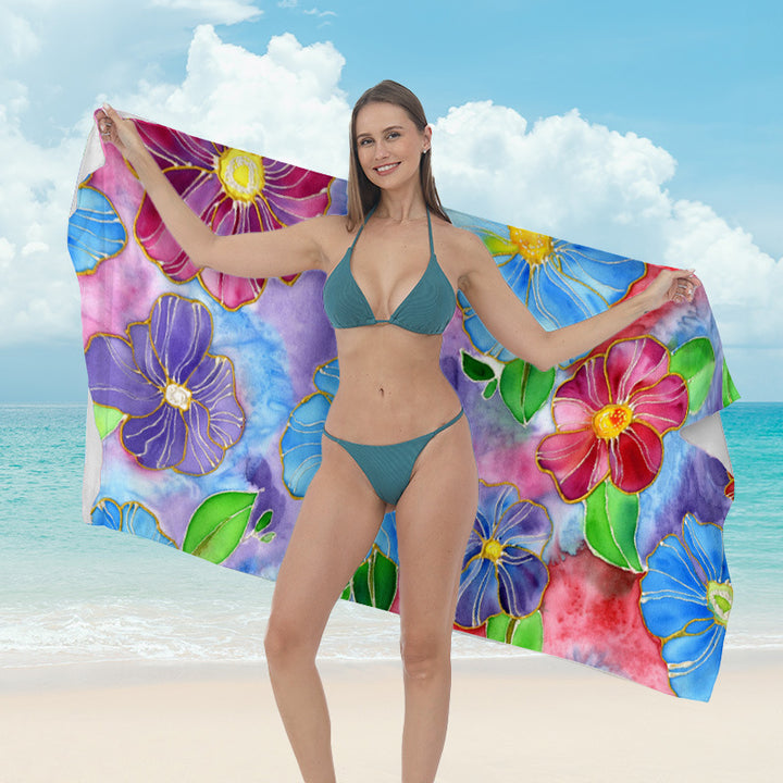 Beach towel with vibrant tropical plant motif Kalsten