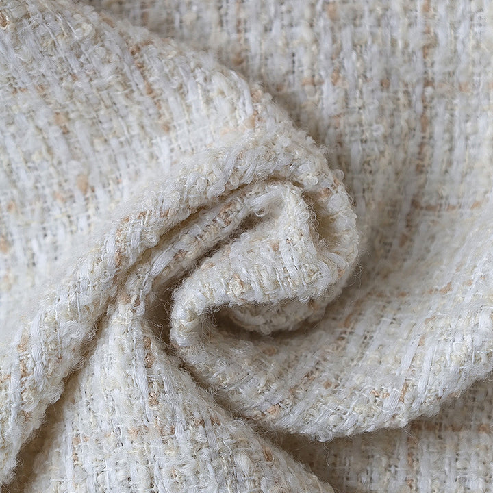 Square cushion cover made of textured bouclé blend with decorative piped seam Kalsten