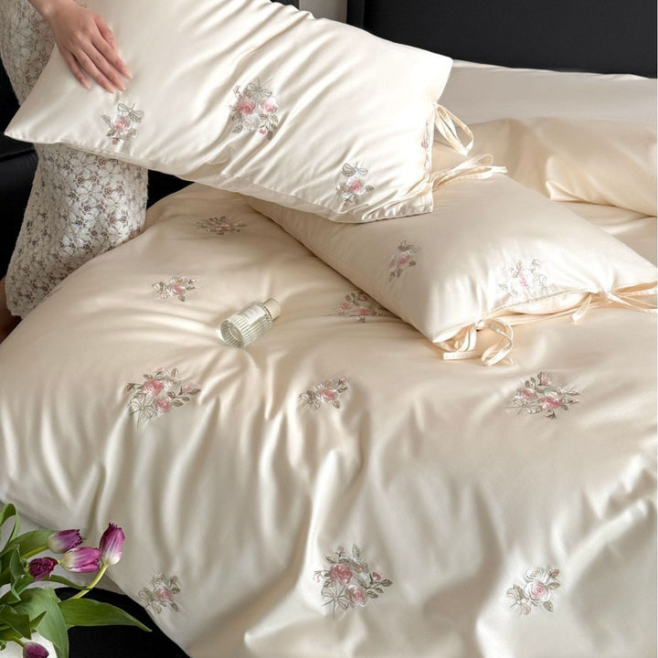 Satin bed linen set with floral hand embroidery and silky shiny finish Kalsten