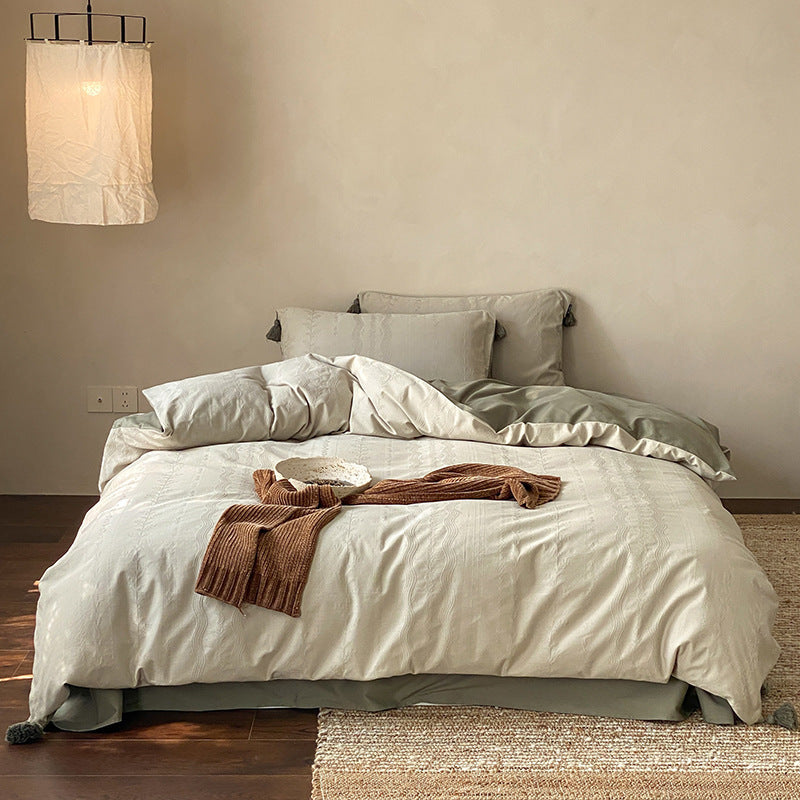 Finely textured cotton satin bedding set with tone-on-tone relief