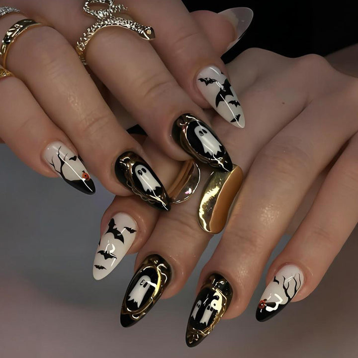 Acrylic nail set with spooky Halloween motifs and eye-catching designs Kalsten
