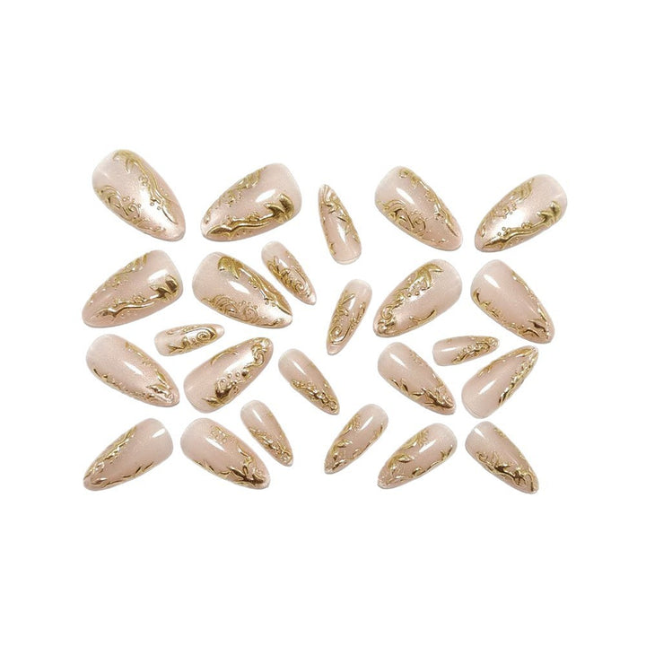 Glamorous artificial nails with delicate gold accents Kalsten