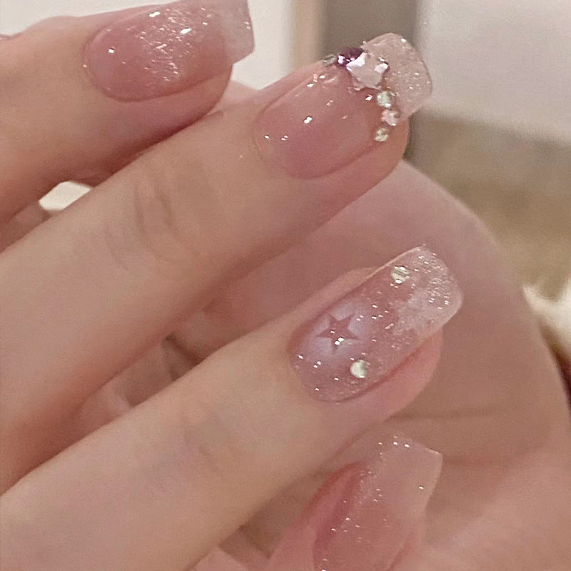 Artistic Press-On Nail Set with Glittery Star Accents Kalsten