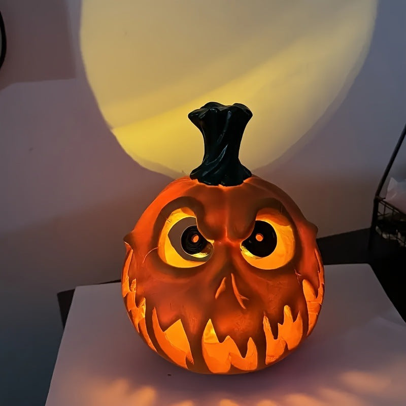Ceramic pumpkin lantern with hollowed-out spooky face and tealight compartment