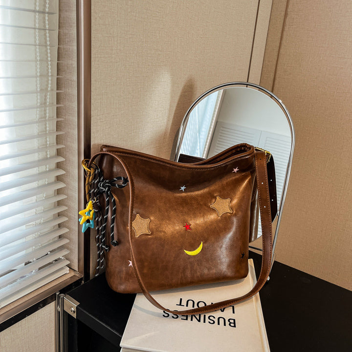Shoulder bag with charming applications Kalsten