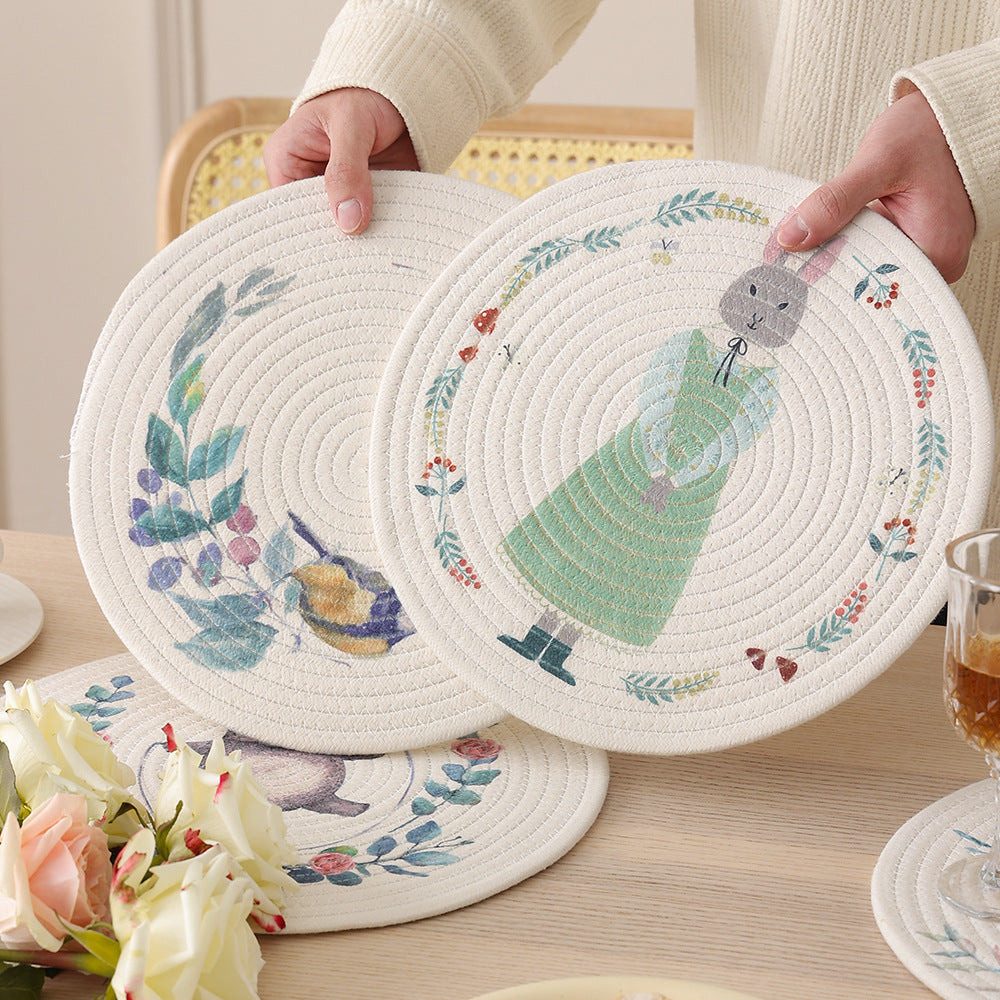 Round quilted table set placemat made of cotton blend with playful rhinoceros print
