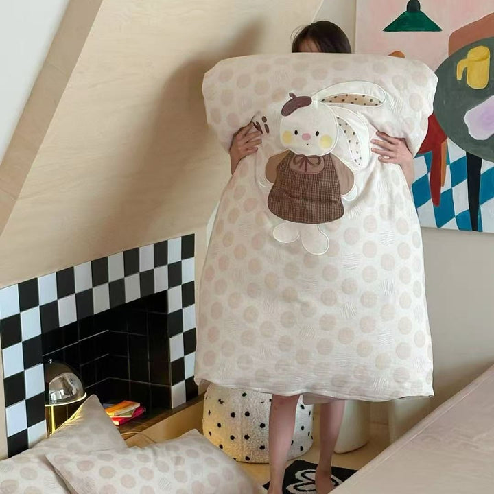Child-friendly bedding set with embroidered rabbit motif and dotted woven texture