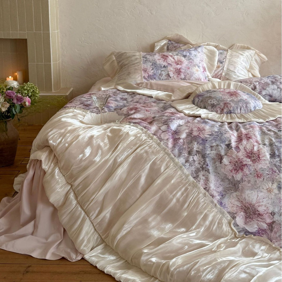 Romantic satin bedding set with floral pattern, ruffle and round cushion
