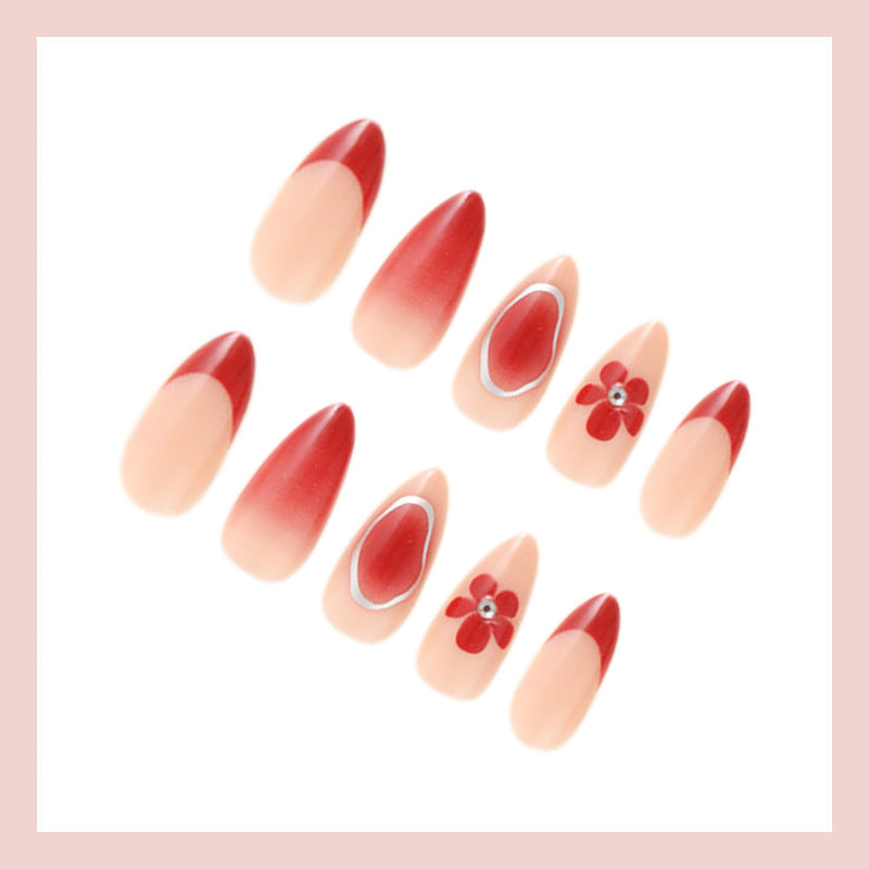 Artificial nail set with elegant flower and ombre accents Kalsten