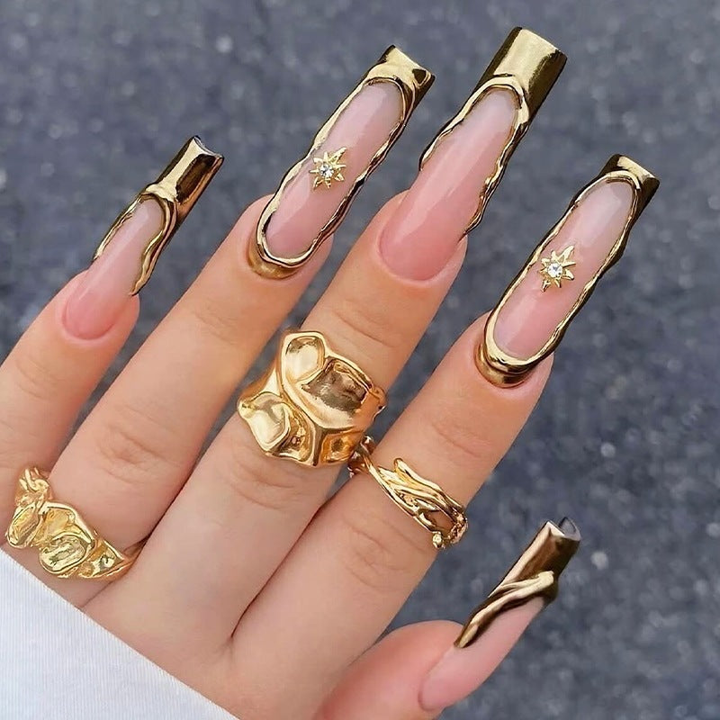 Acrylic nail set with extravagant gold accents Kalsten