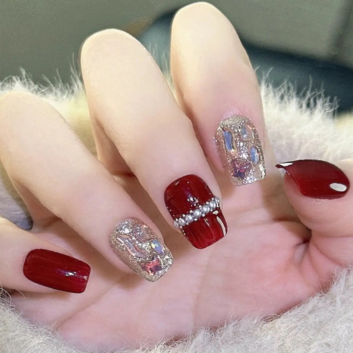 Glamorous artificial nail set with sparkling 3D applications and elegant embellishments Kalsten