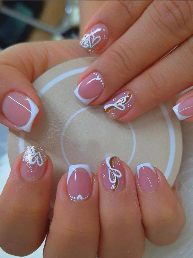 Elegant Heart-Embellished Nail Art Design Kalsten