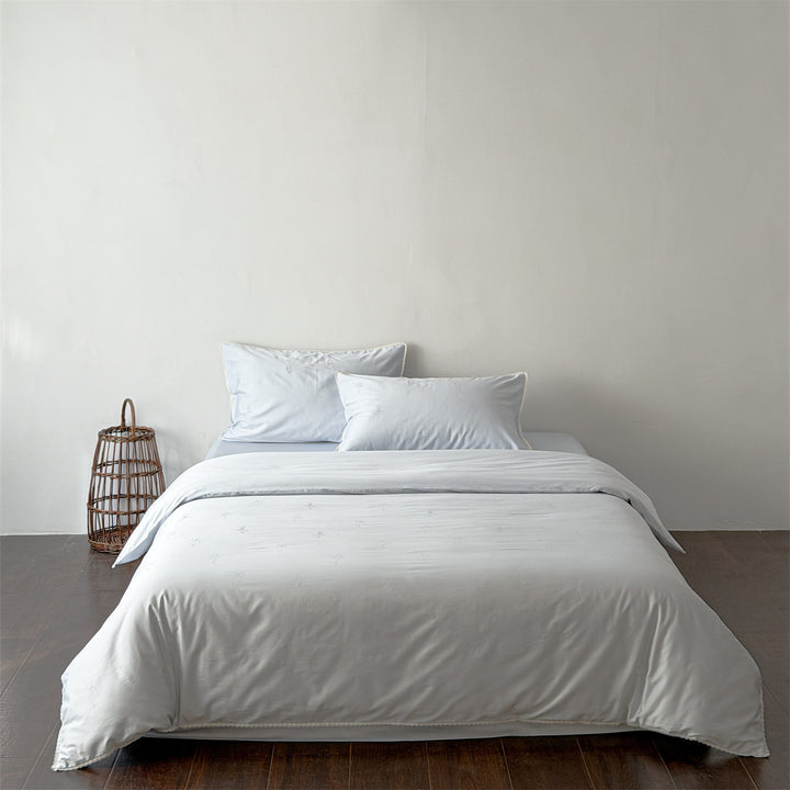 High-quality bed set made of cotton satin with subtle ballerina relief embroideries & lace edging