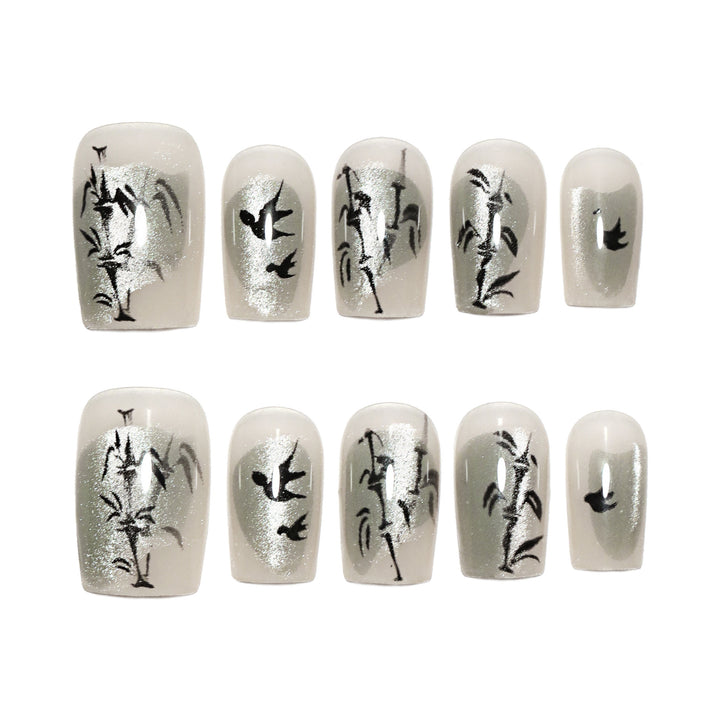 Handcrafted acrylic nails with decorative bird motifs Kalsten