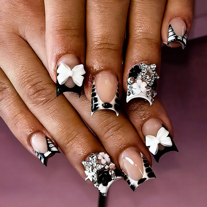 Artificial nail design with elaborate 3D decorations Kalsten