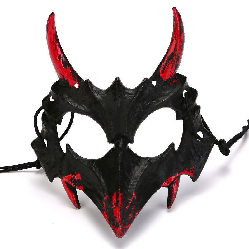 Half-face mask with flashing vampire teeth and adjustable rubber band