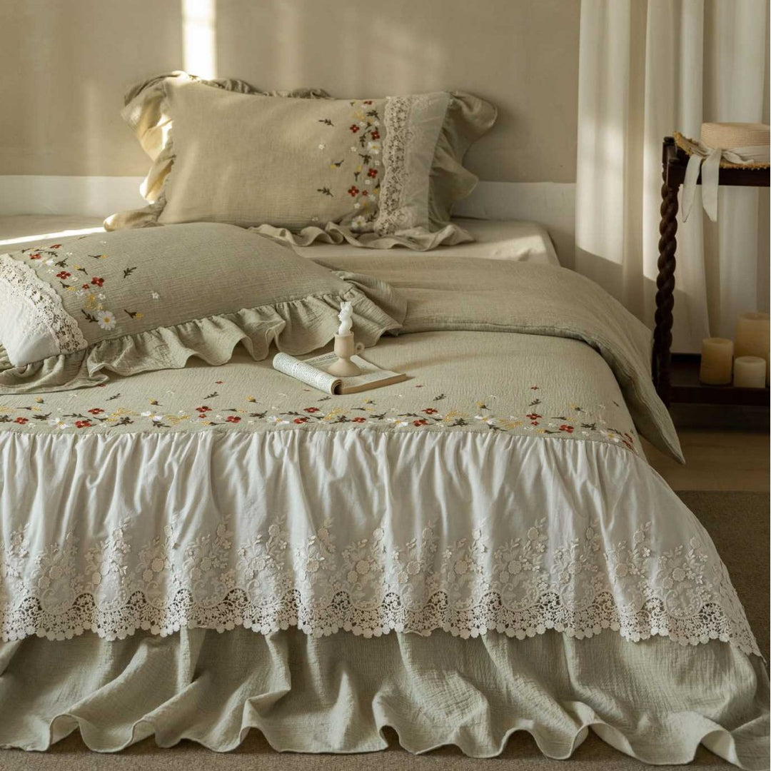 Romantic bedding set with lace bed skirt, embroidered floral decor and ruffle