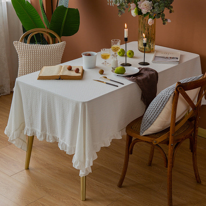 Rectangular tablecloth made of cotton waffle fabric with fine ruffle trim