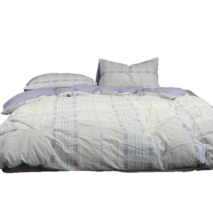 Cotton percale bedding set with a light quilted texture and subtle striped texture