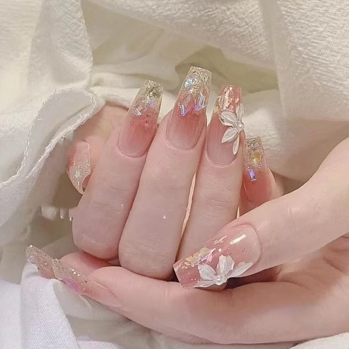 Glamorous artificial fingernails with glitter and moon designs Kalsten