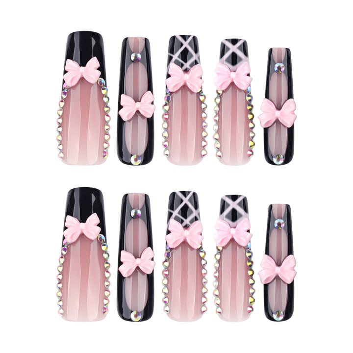 Artistic acrylic nails with floral design and rhinestone bow Kalsten