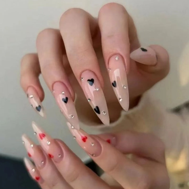 Glamorous artificial nails with heart accents Kalsten