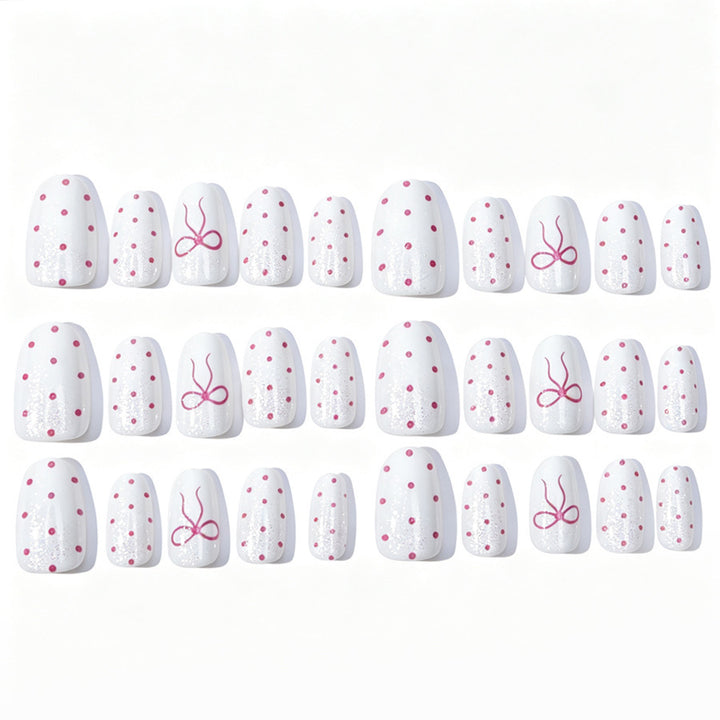 Artificial nail set with delicate dots and bow pattern Kalsten