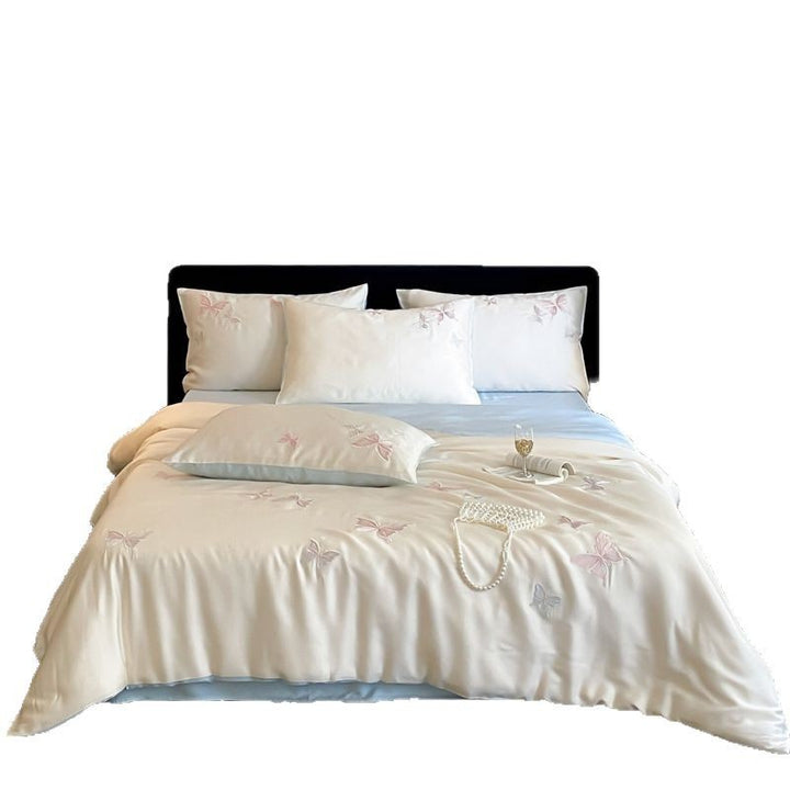 Elegant satin bedding set with embroidered butterfly details