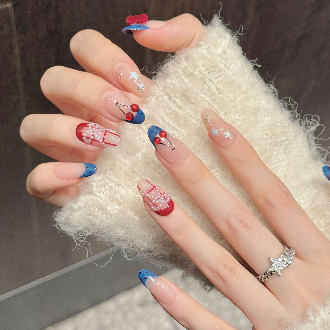Artistic Press-On Nail Set with Decorative Cherry and Star Accents