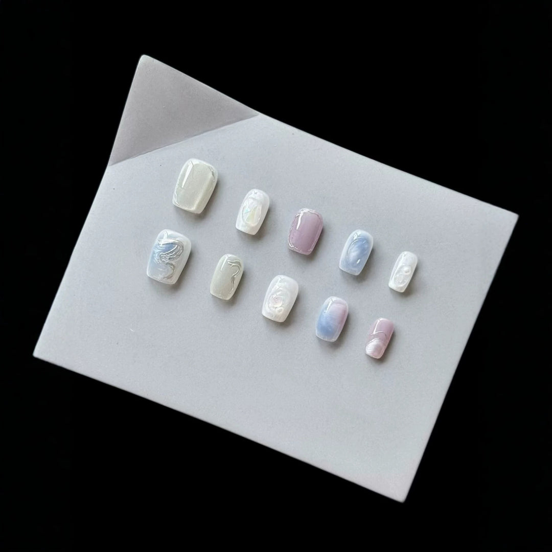 Artistic Press-On Nail Art Set with Pearlescent and Marble Designs