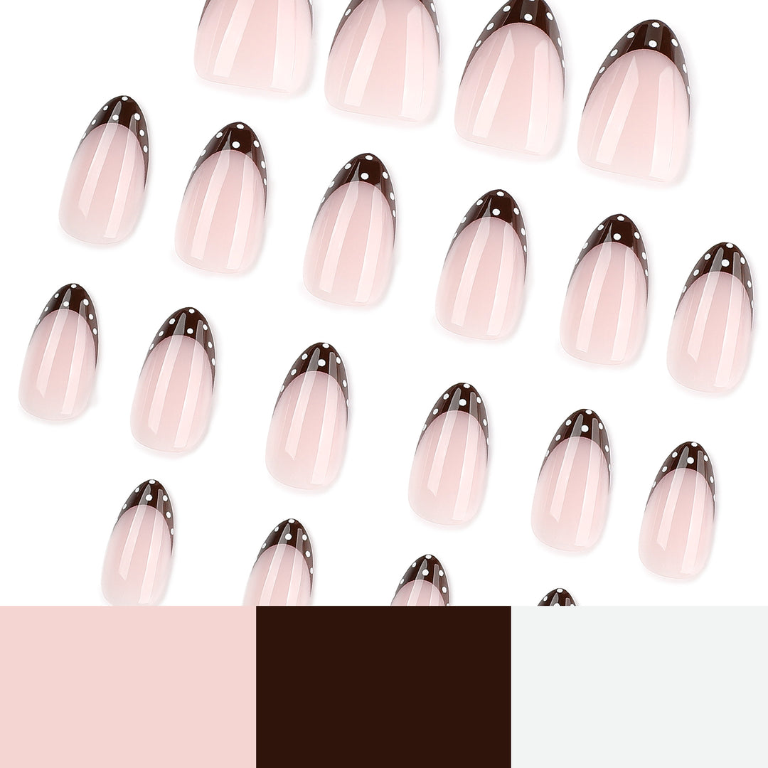 Artful nail art with elegant French tips and glitter accents Kalsten