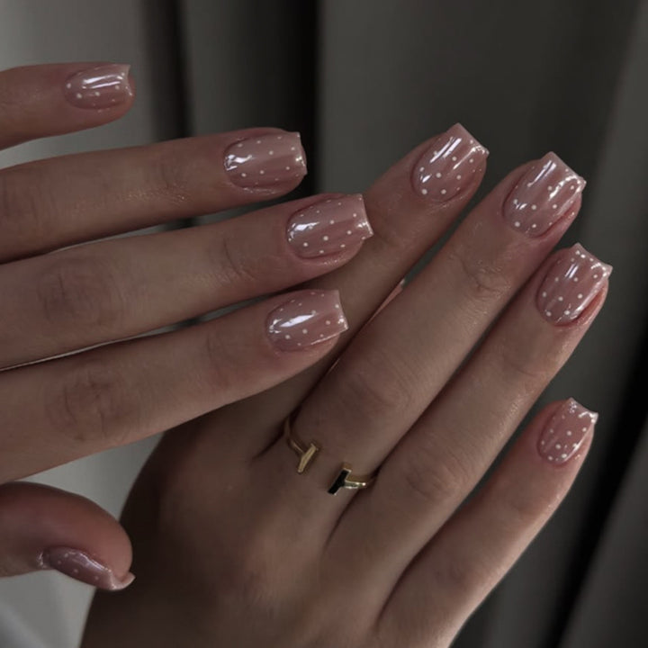 Artful Nail Art with Flower Design and Blue French Tip Kalsten
