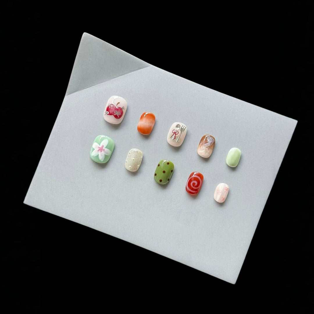 Artistic Press-On Nail Set with Unique Sketch Designs