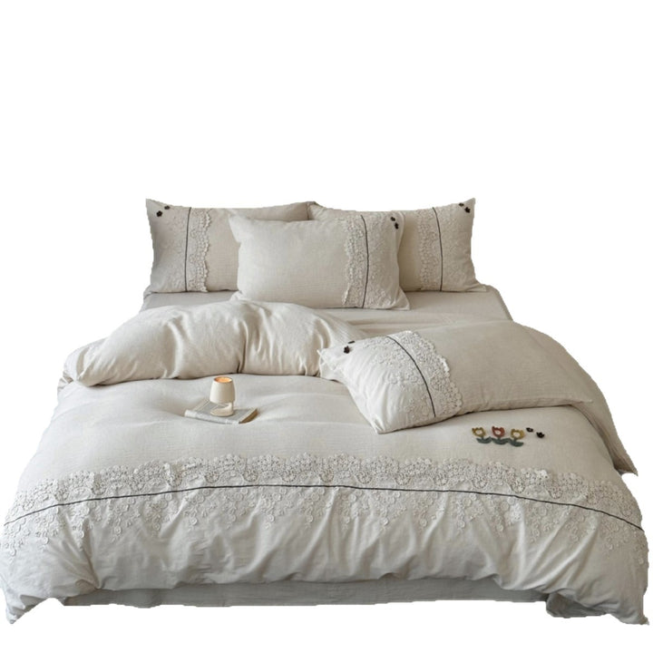Bedding set in linen look with embroidered lace border and fine embroidery