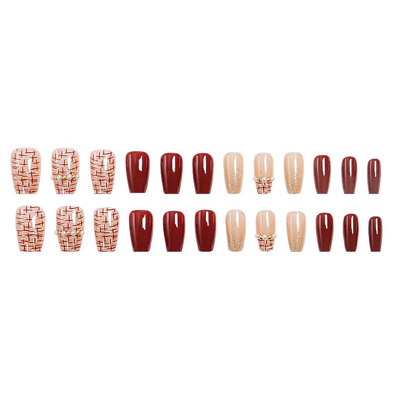 Artificial nail set with glamorous glitter and textural accents Kalsten
